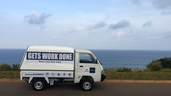 Suzuki Super Carry White Truck on Road