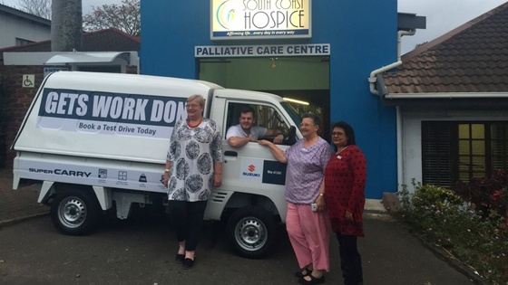 Suzuki Super Carry parked in front of care centre  