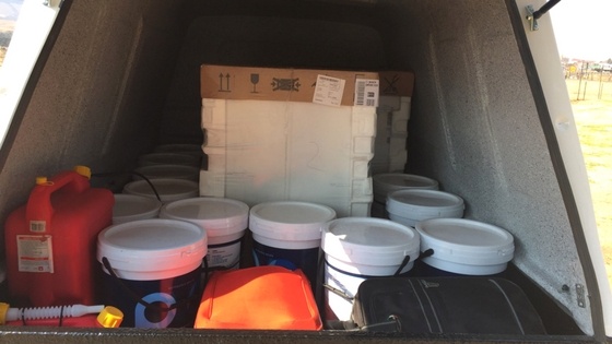 Inside of a Suzuki Super Carry 750 kilograms of paint, fuel and dishwashers.
