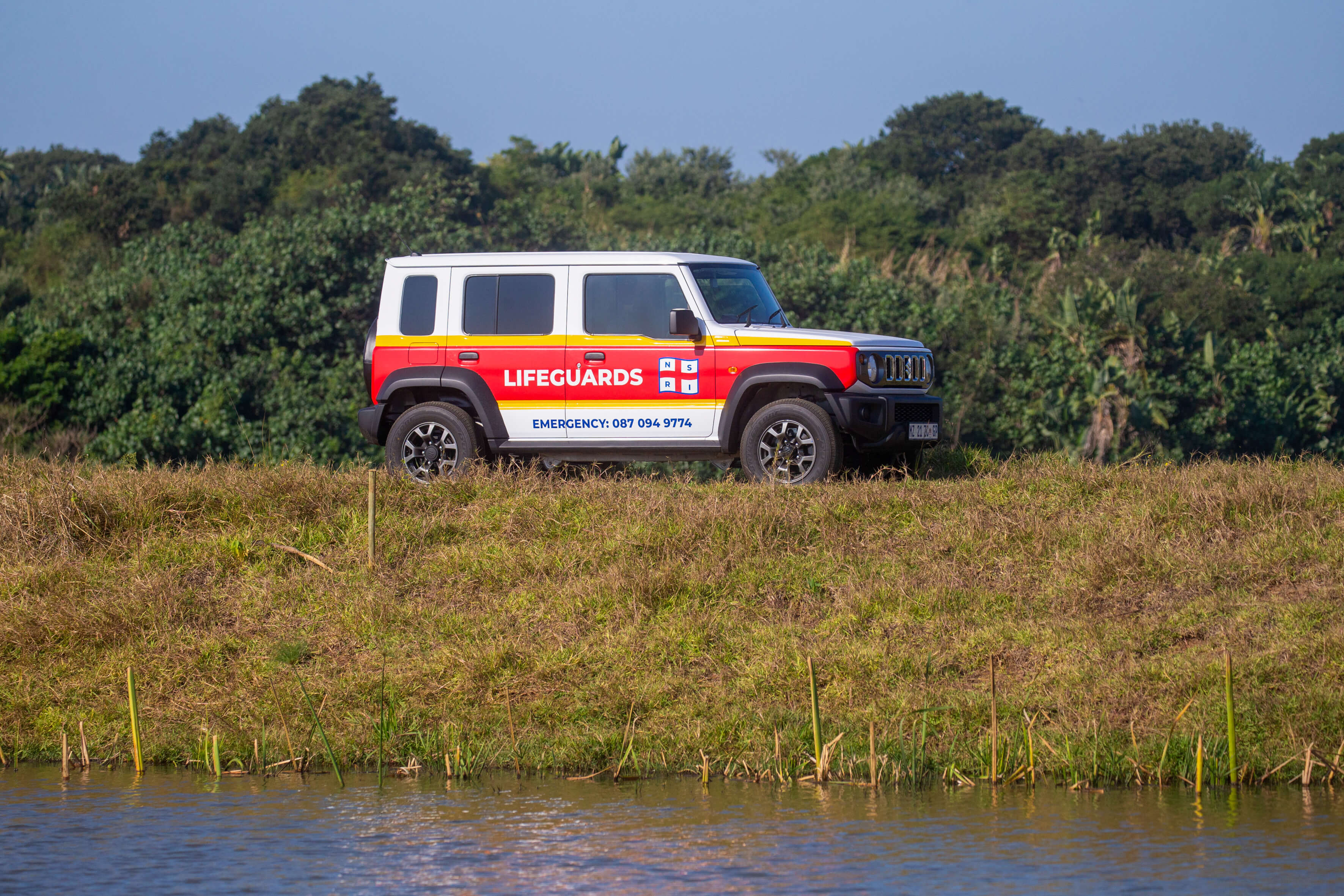 NSRI Club Med Suzuki Jimny parked by the river