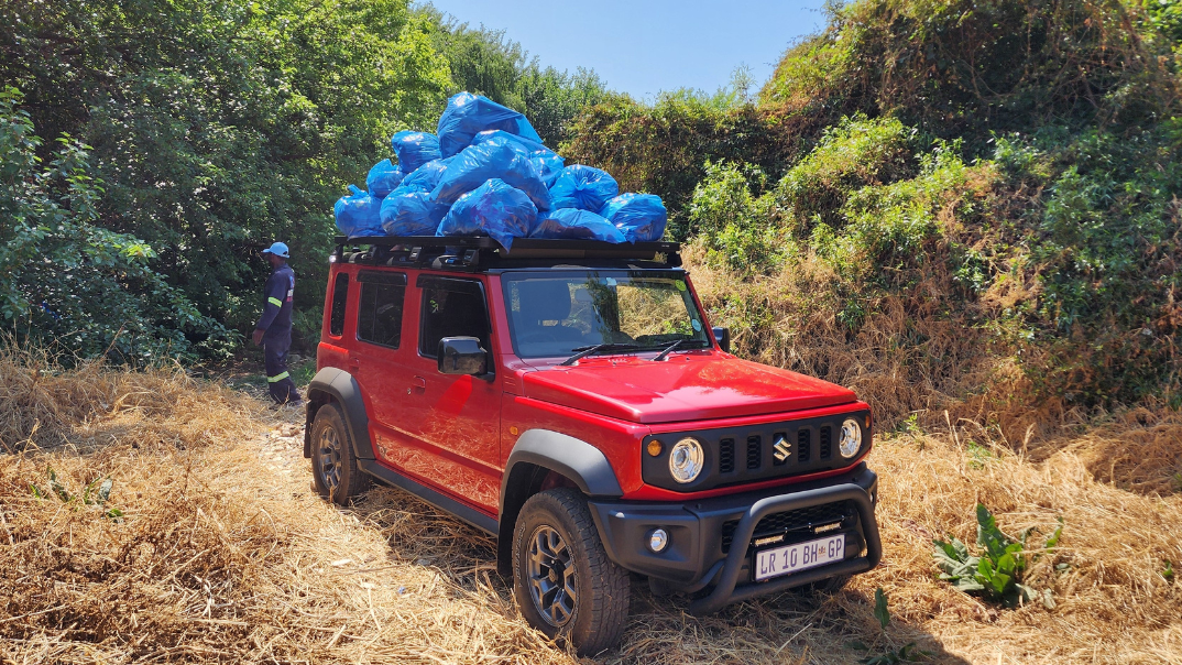 Red Suzuki Jimny 5-Door - Blog Header - 2024