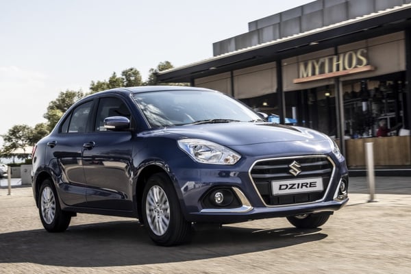 Suzuki Dzire Parked on Paving 