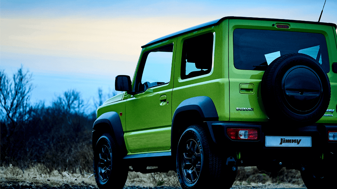 Green Suzuki Jimny on the Rock 4x4 Trail