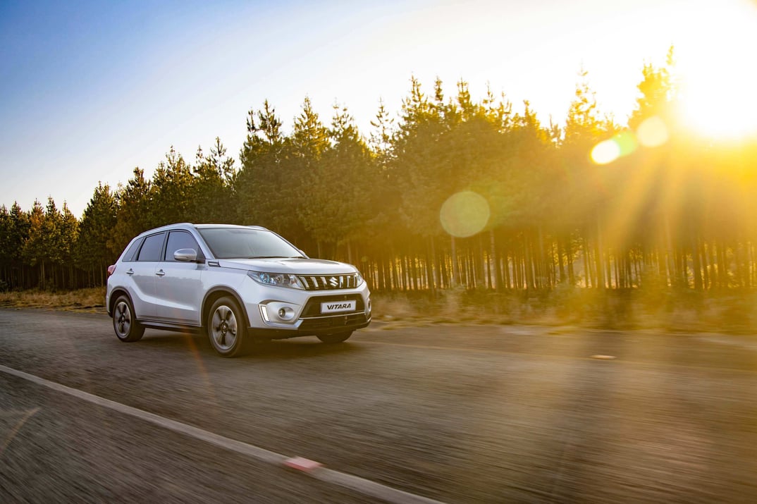 Silver Suzuki Vitara driving 