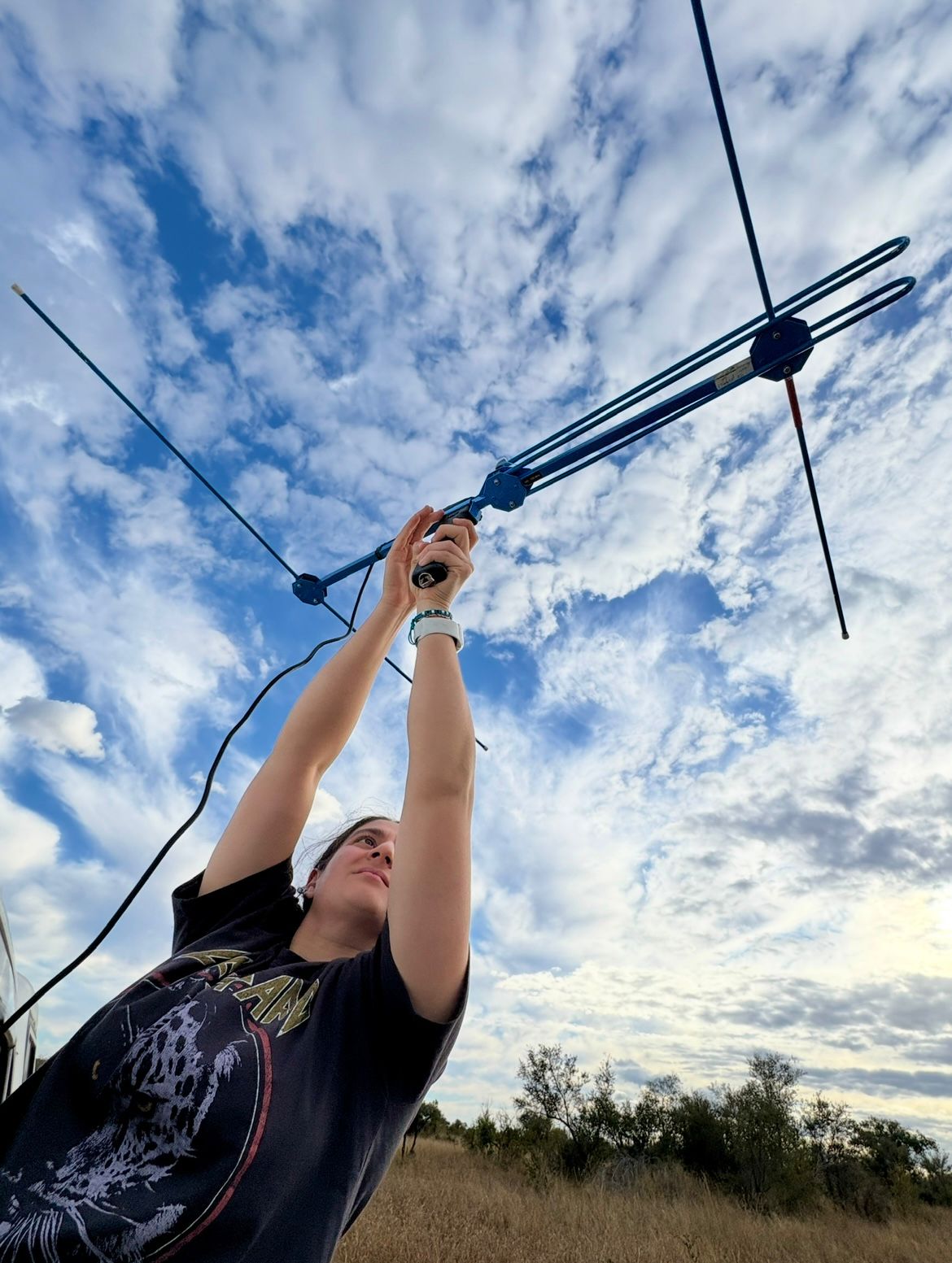 Kiyana listens for the telltale beep of a collared lion