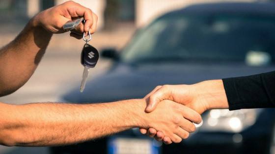 handing over Suzuki car keys