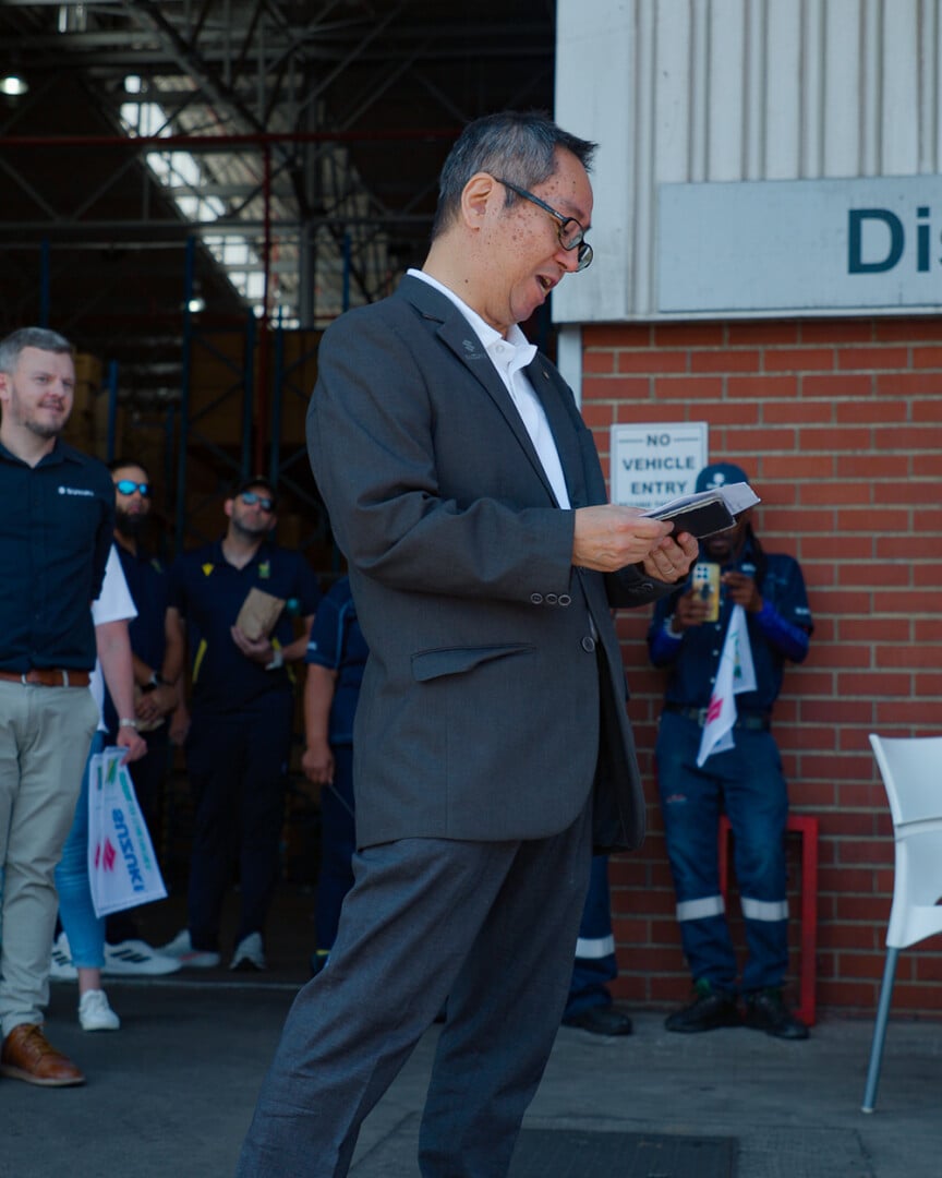 man standing looking down 